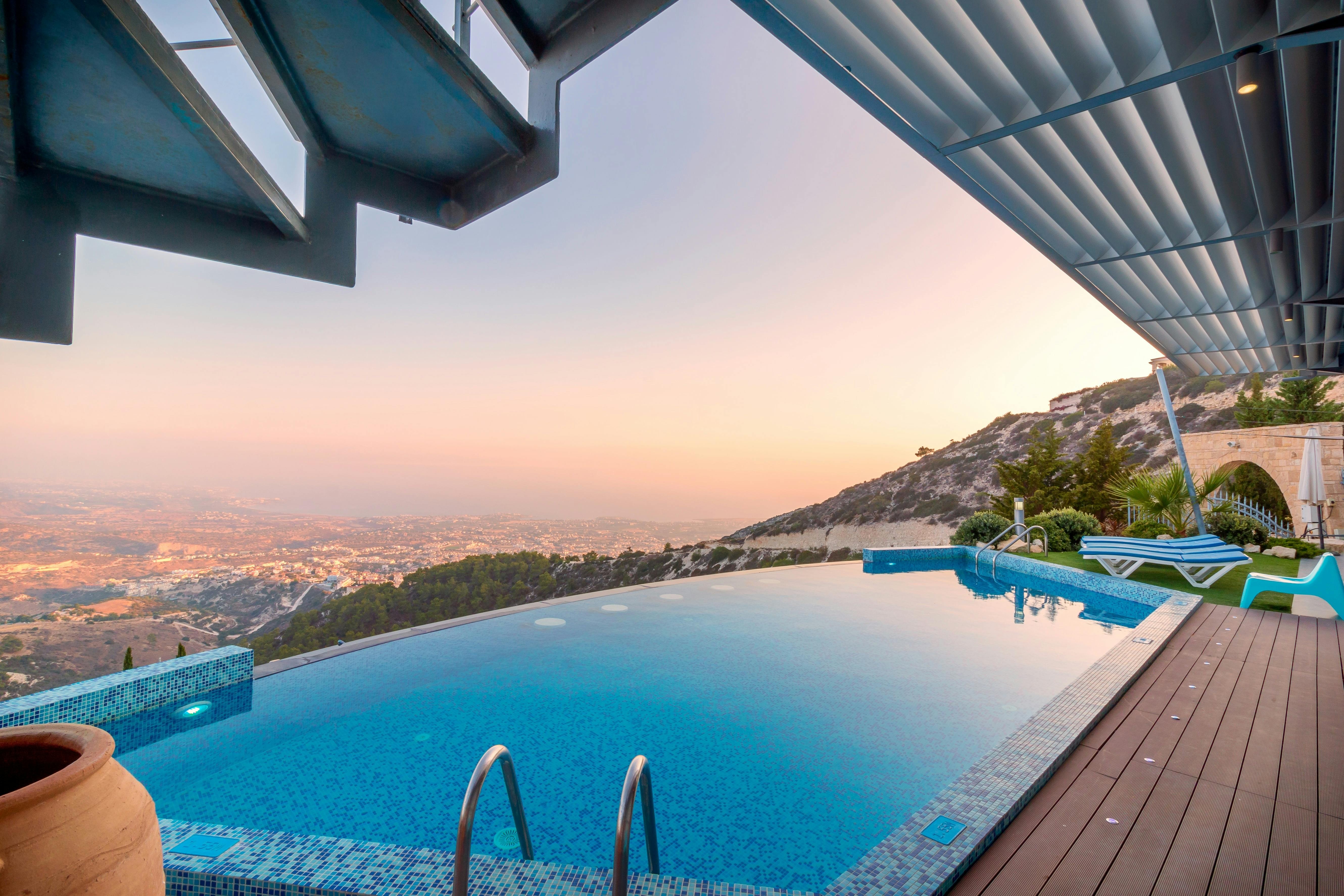 An inviting above-ground pool with a sturdy ladder in a sunny backyard